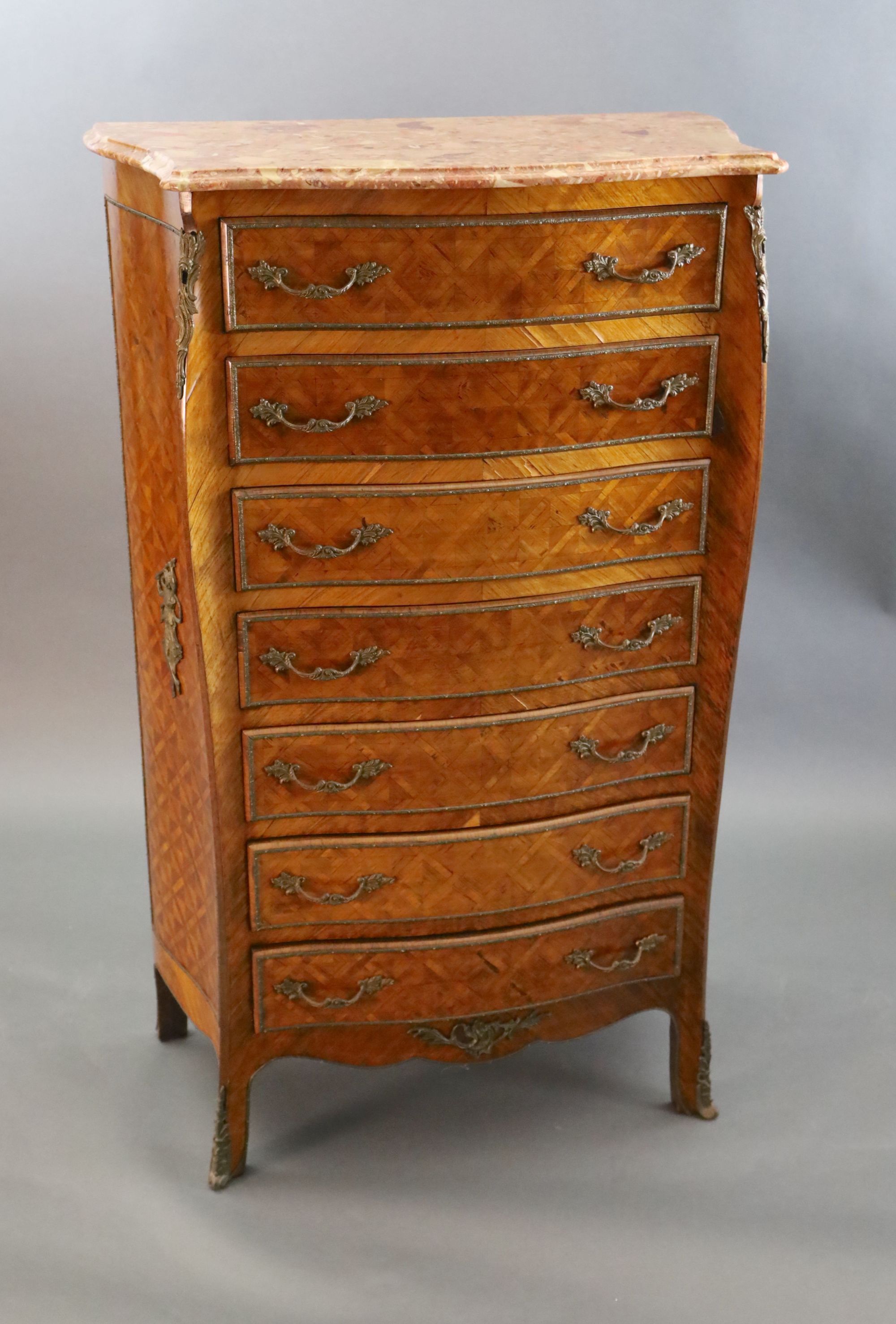 An early 20th century French Louis XVI style parquetry semanier, W.2ft 9in. D.1ft 5in. H.4ft 5in.